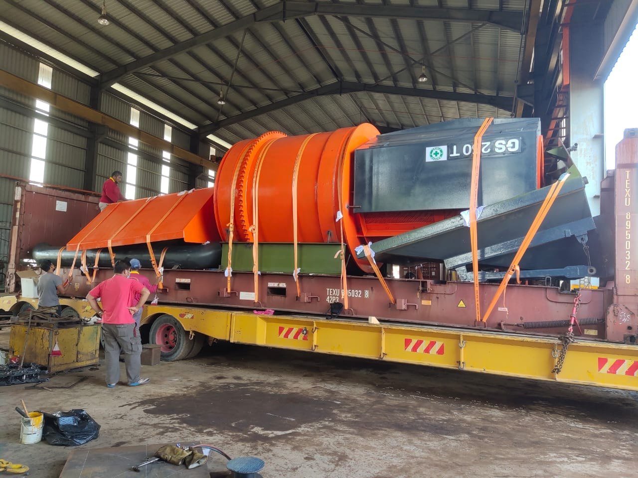 GS210T being moved onto a flatbed